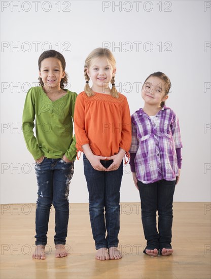 Girls smiling together in bare feet