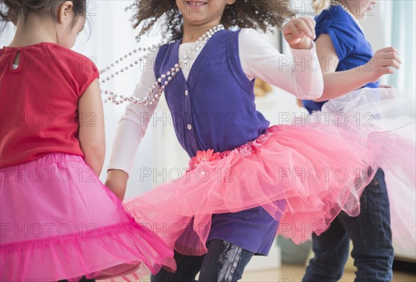 Girls playing dress up together