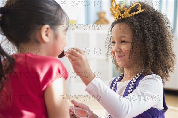 Girls playing dress up together