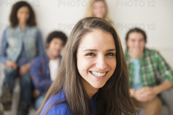 Woman smiling in living room