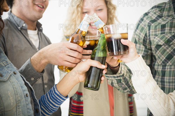 Friends toasting each other at party