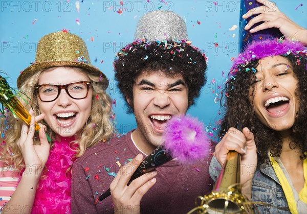 Friends wearing hats at party