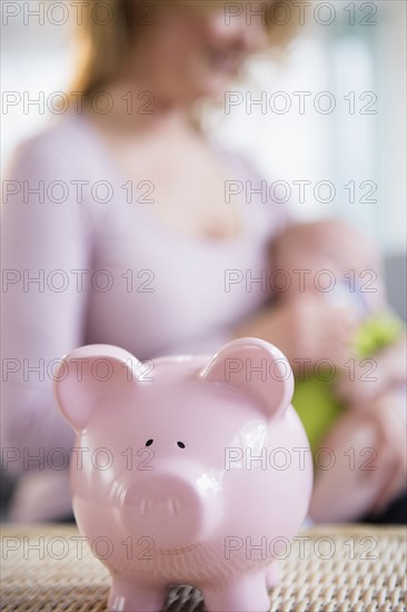 Close up of piggy bank on table