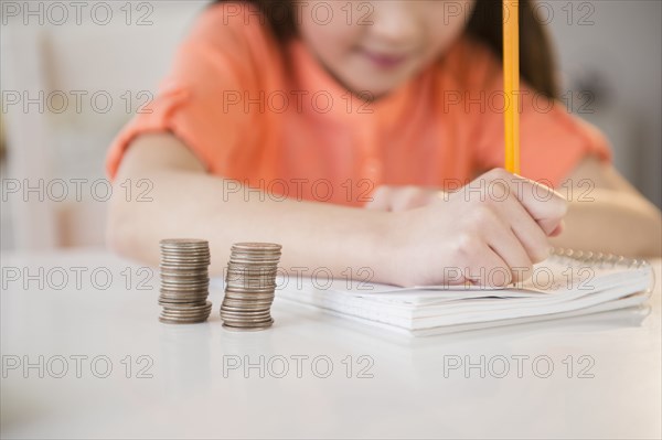 Mixed race girl doing homework