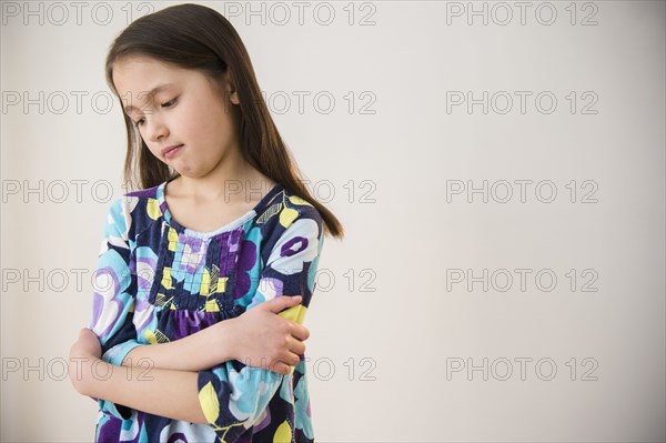 Mixed race girl pouting