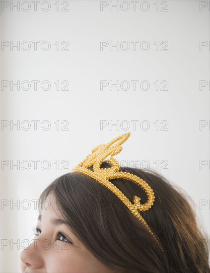 Hispanic girl wearing tiara