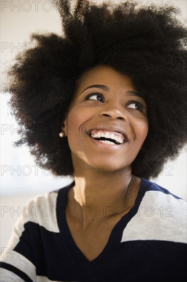 Mixed race woman smiling