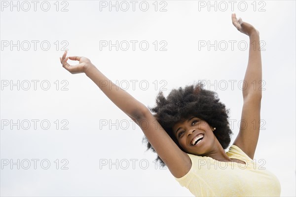 Mixed race woman smiling