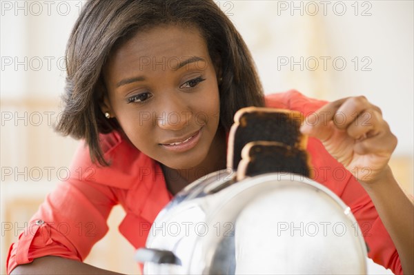 Black woman with burned toast