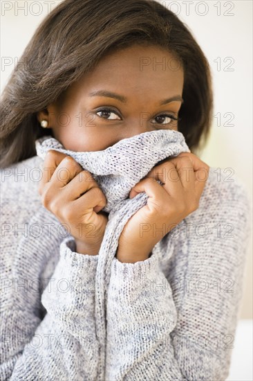 Black woman wearing warm sweater