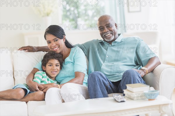 Three generations of family relaxing together