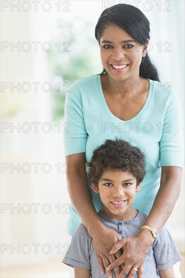 Mother and son hugging