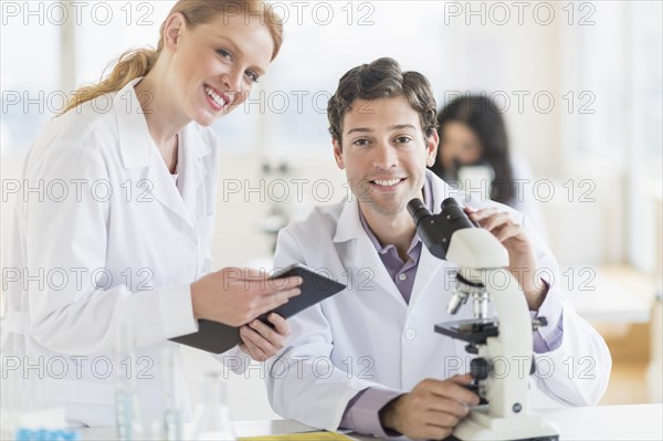 Scientists working in laboratory