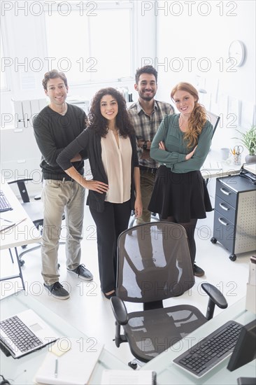 Business people smiling together in office