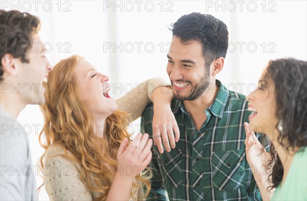 Friends laughing together