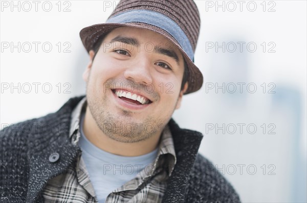 Mixed race man smiling