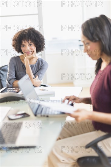 African American businesswomen working in office