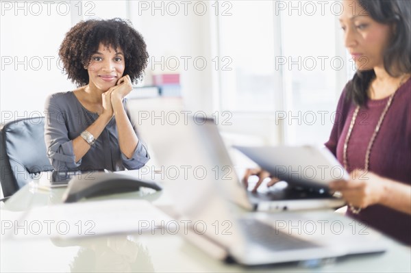 African American businesswomen working in office