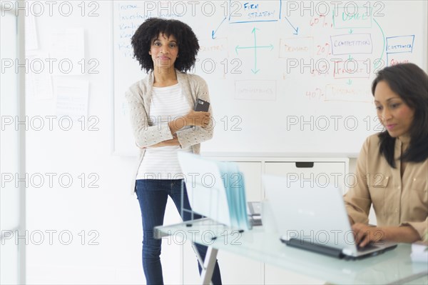 African American businesswomen working in office