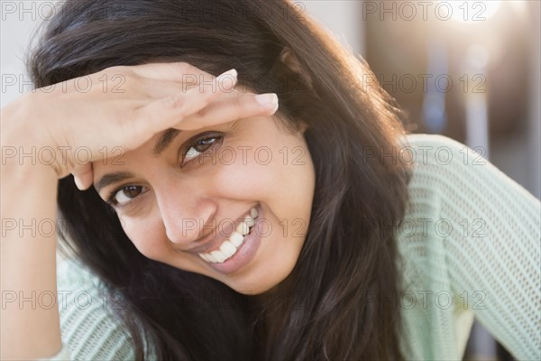 Close up portrait of smiling Asian woman