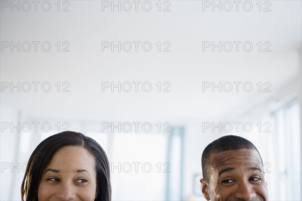 Couple engaged in sideways glance