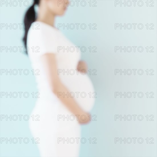 Defocused profile of pregnant Japanese woman