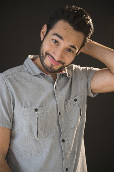 Mixed race man smiling