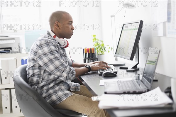 Black businessman working in office