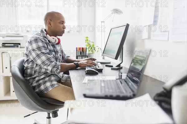 Black businessman working in office