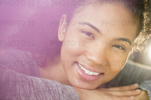 Mixed race woman smiling