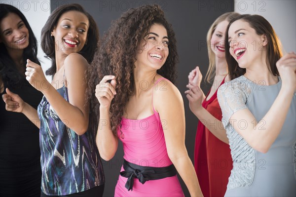 Women dancing together