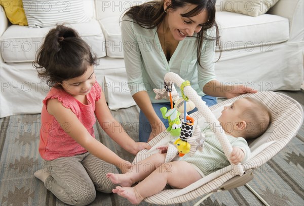 Family relaxing together in living room