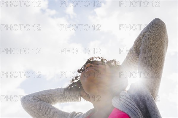 African American woman standing outdoors