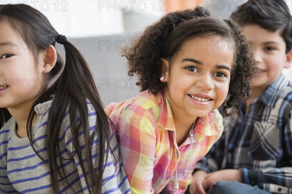 Children smiling in living room