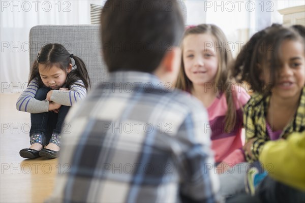 Children excluding girl in group