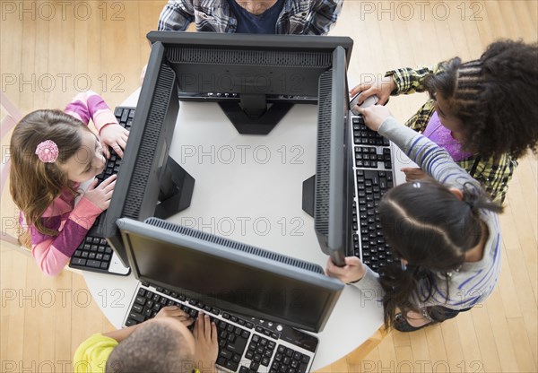 Children using computers in classroom
