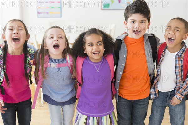 Students standing in line in classroom