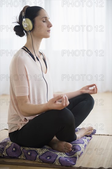 Caucasian woman meditating