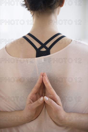 Caucasian woman practicing yoga