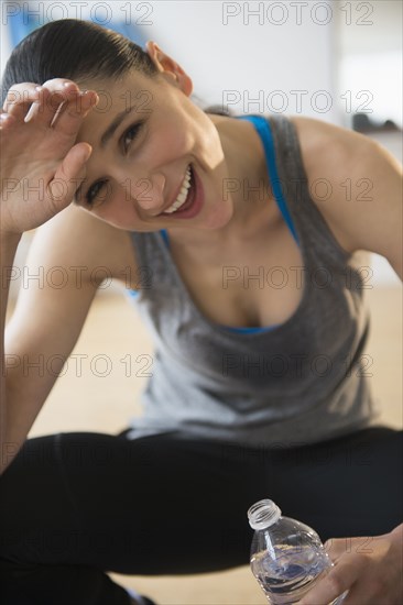 Caucasian woman resting after exercise