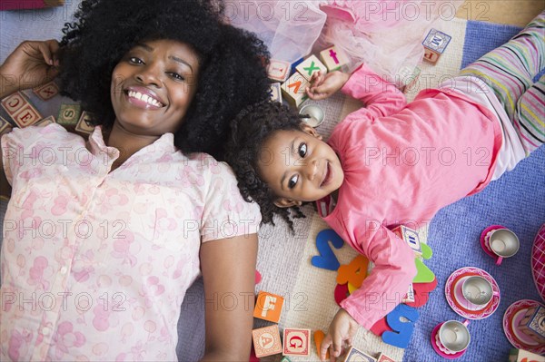 Mother and daughter playing together