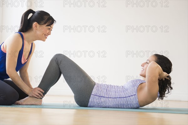 Women exercising together in gym