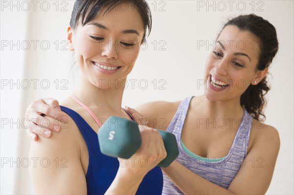 Women exercising together in gym