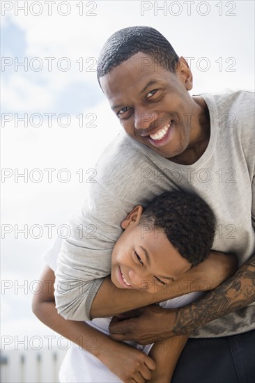 Father and son playing outdoors