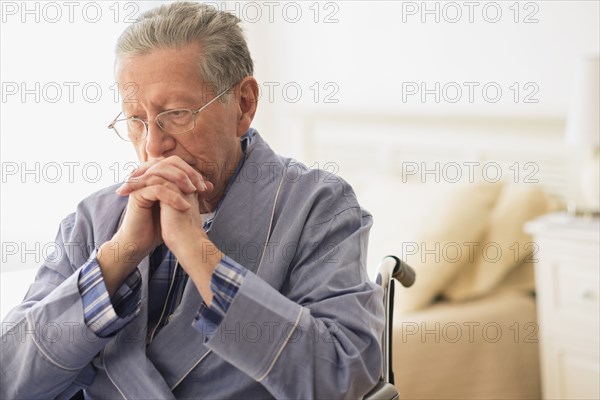 Senior Caucasian man sitting in wheelchair