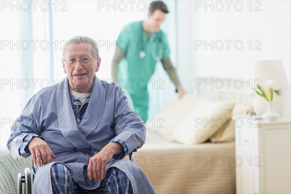 Senior Caucasian man smiling in wheelchair