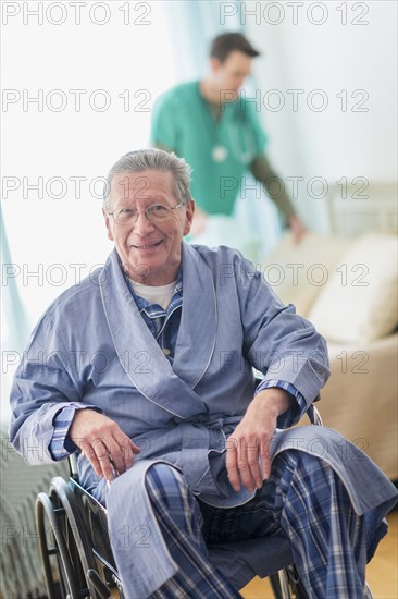 Senior Caucasian man smiling in wheelchair