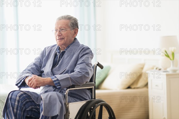 Senior Caucasian man sitting in wheelchair