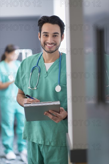 Mixed race nurse working in hospital