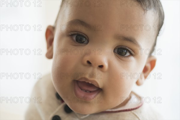 Close up of mixed race baby's face